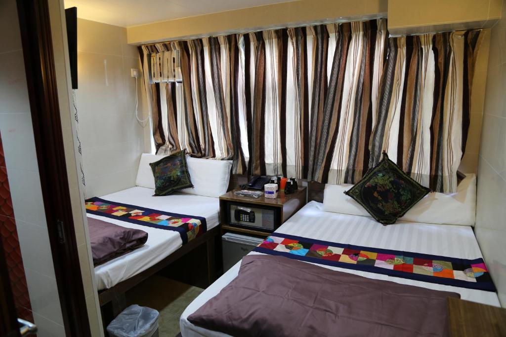 Rúm í herbergi á Russian Hostel