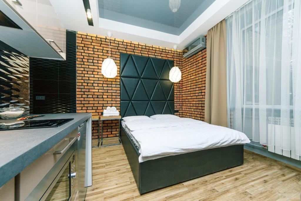 Postel nebo postele na pokoji v ubytování Tomas apartments
