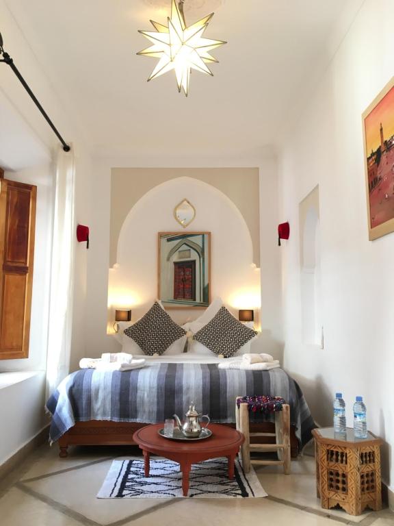 Postel nebo postele na pokoji v ubytování Riad Dar Kasal