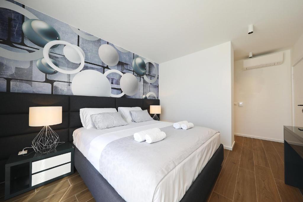 Postel nebo postele na pokoji v ubytování Homes4you K4