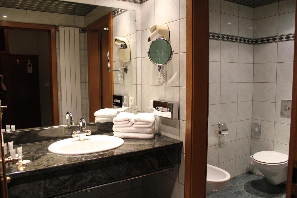 Koupelna v ubytování Hotel Le Mandelberg