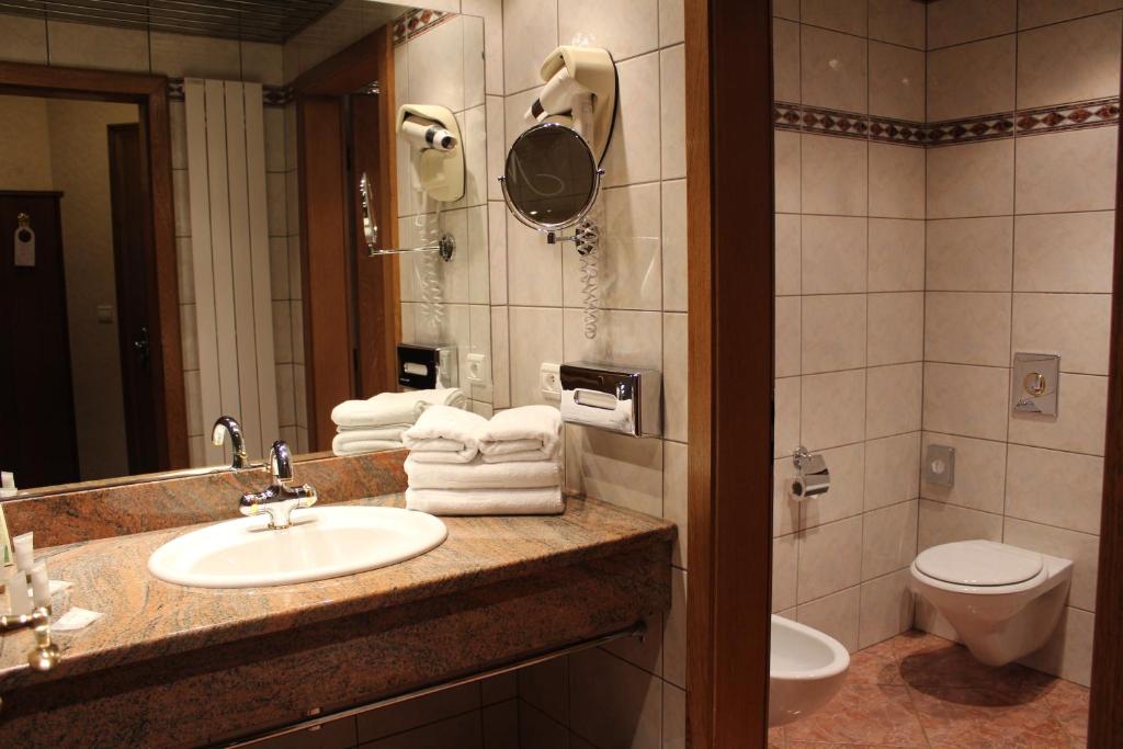 Koupelna v ubytování Hotel Le Mandelberg