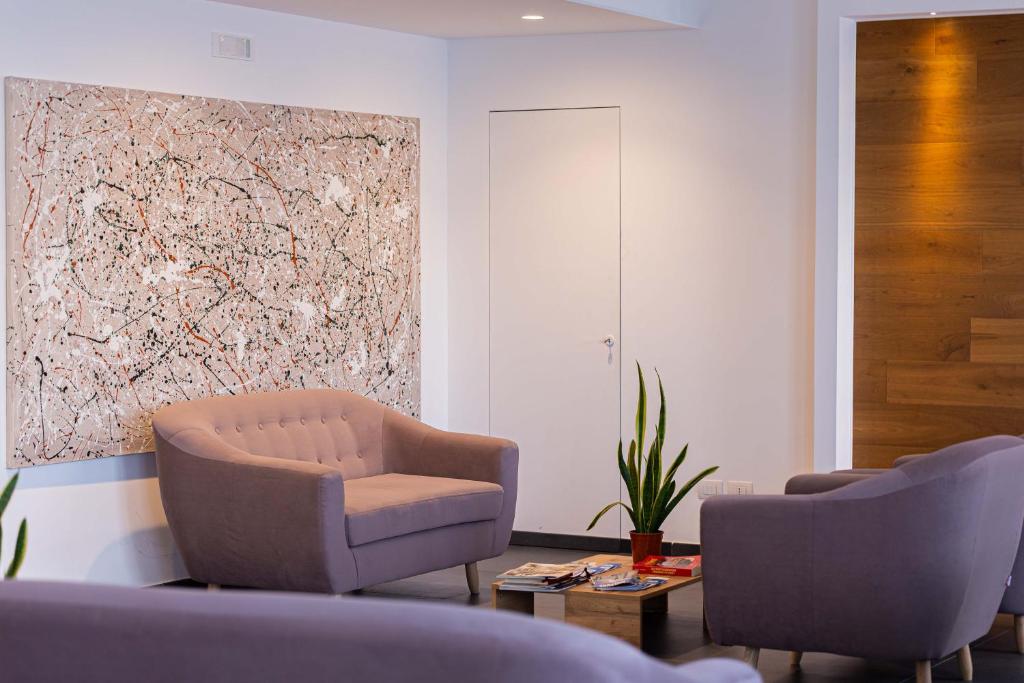 Posezení v ubytování Moma Hotel Wellness & Spa
