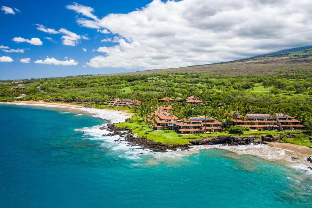 an aerial view of a resort on the beach at Makena Surf- CoralTree Residence Collection in Wailea