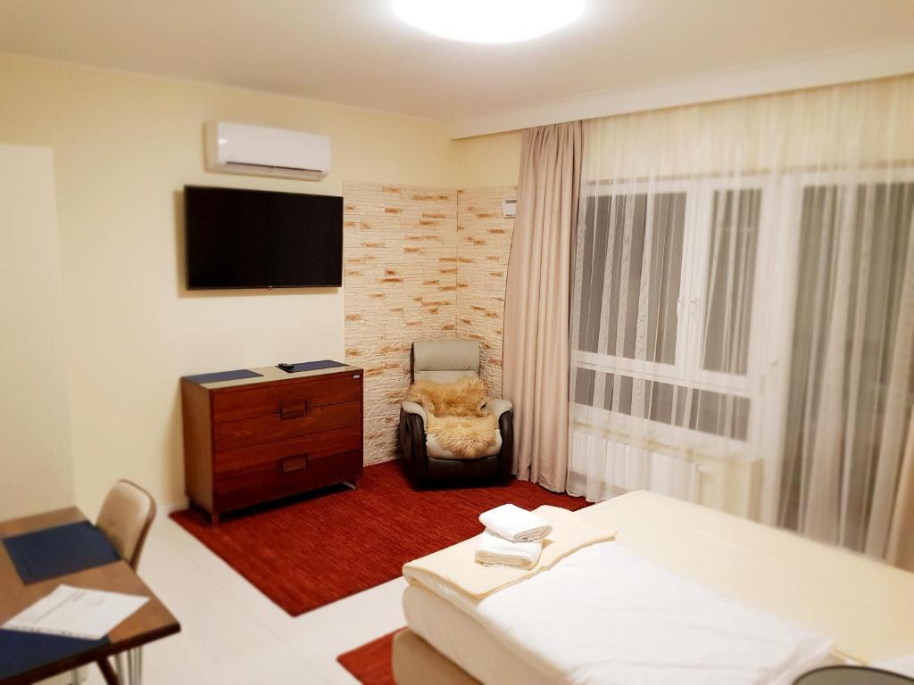 Postel nebo postele na pokoji v ubytování Apartamenty Dom Saski 10 minut od Centrum Warszawy