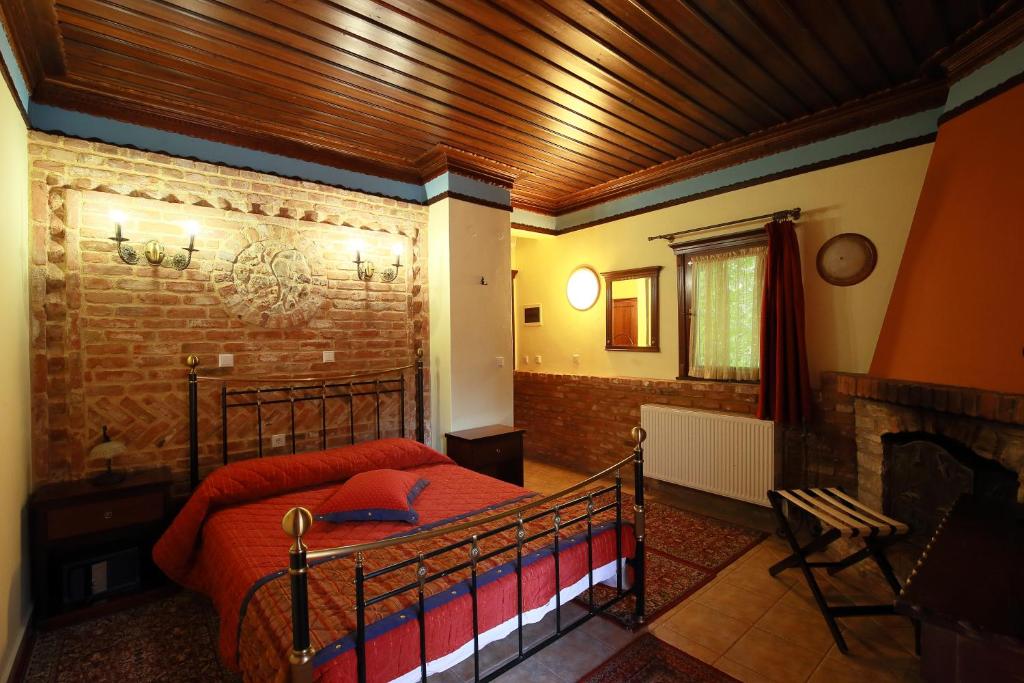 Postel nebo postele na pokoji v ubytování Hotel Nemesis