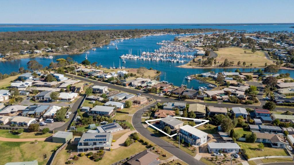 an aerial view of a town with a marina at Tanjil in Paynesville