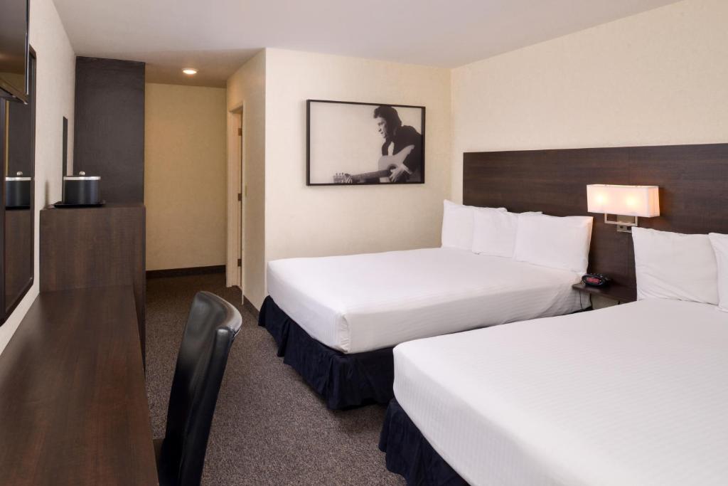 Postel nebo postele na pokoji v ubytování Steam Plant Hotel