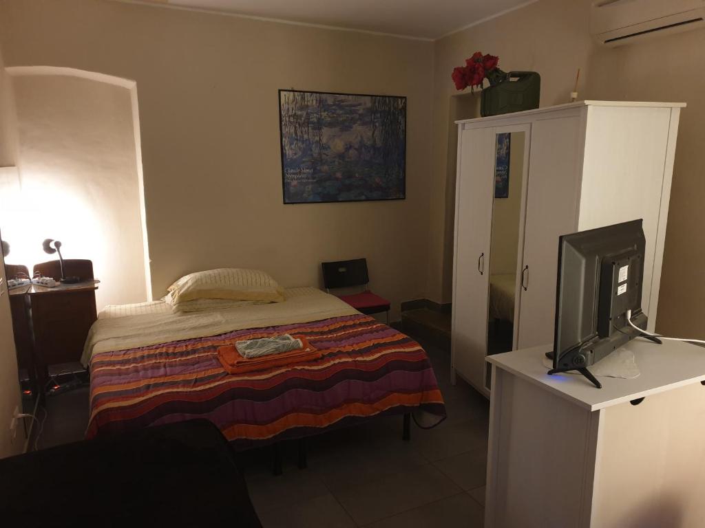 Postel nebo postele na pokoji v ubytování La Casa di Daniele