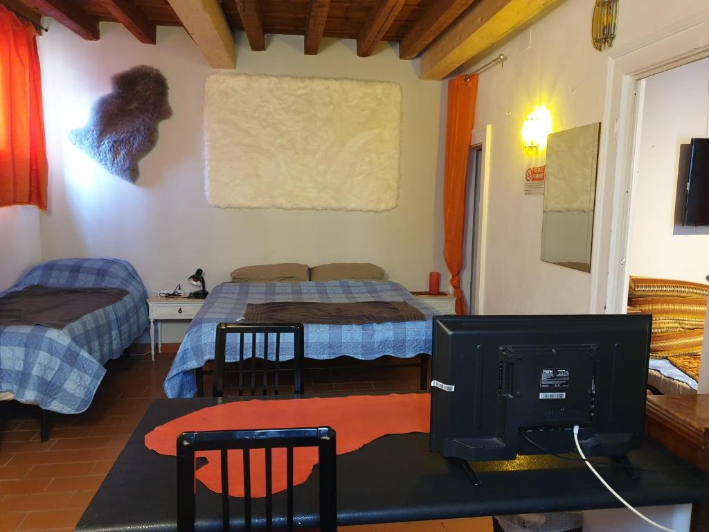 Postel nebo postele na pokoji v ubytování La Casa di Daniele