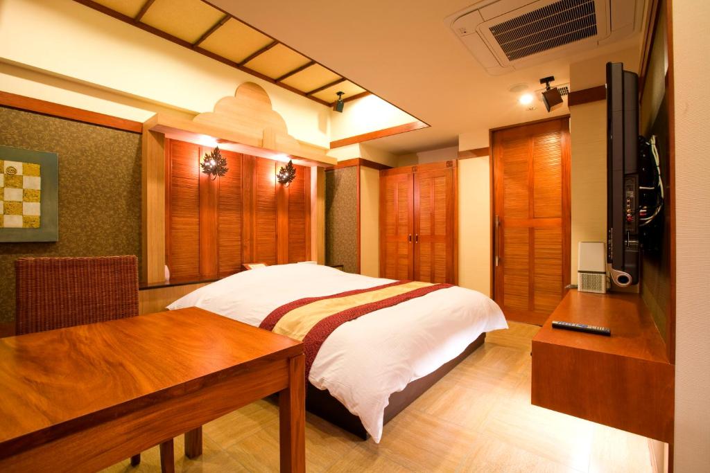 Postel nebo postele na pokoji v ubytování Hotel Bintang Pari Resort (Adult Only)