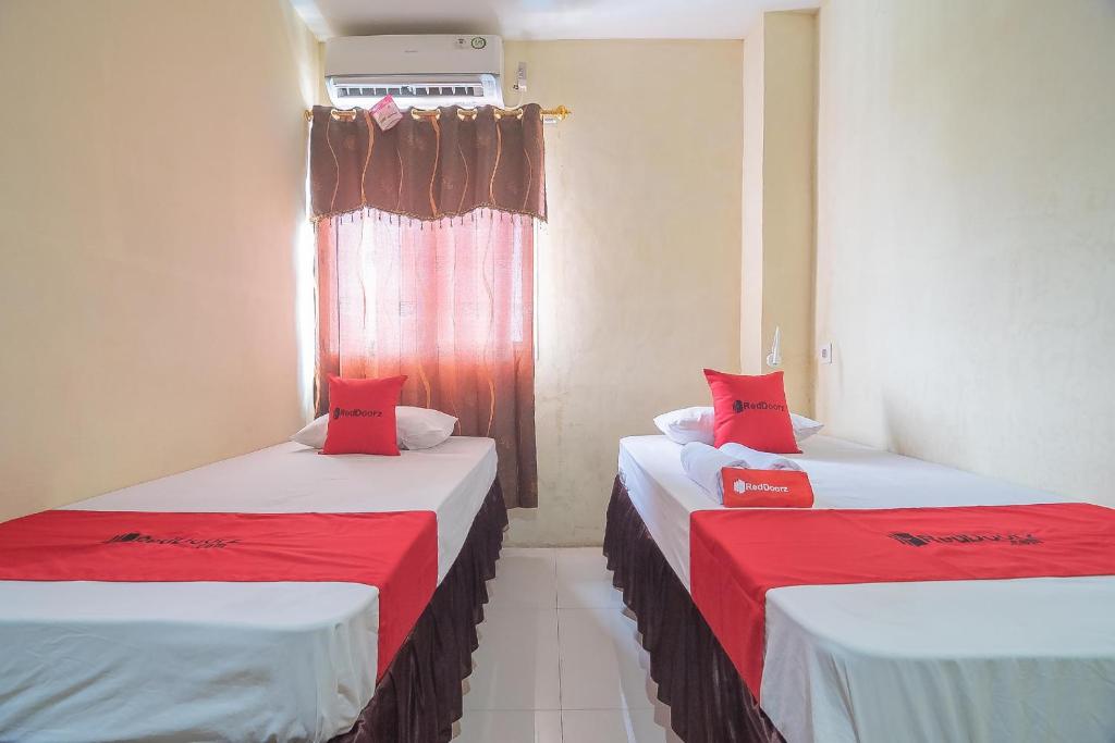 RedDoorz Syariah At Jalan cilik Riwut Kapuas - Chambre Lits Jumeaux