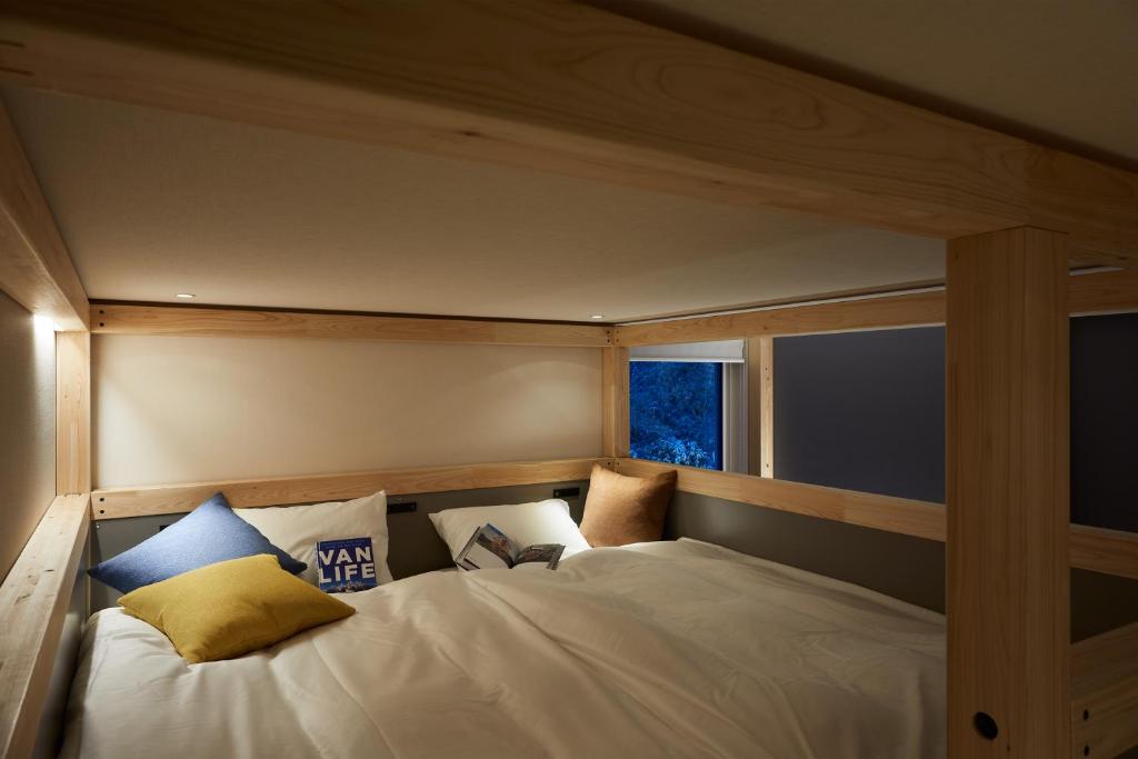 Postel nebo postele na pokoji v ubytování BEB5 Tsuchiura by Hoshino Resorts