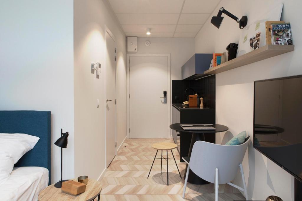 Postel nebo postele na pokoji v ubytování ROXI The Urban Residence Brussels