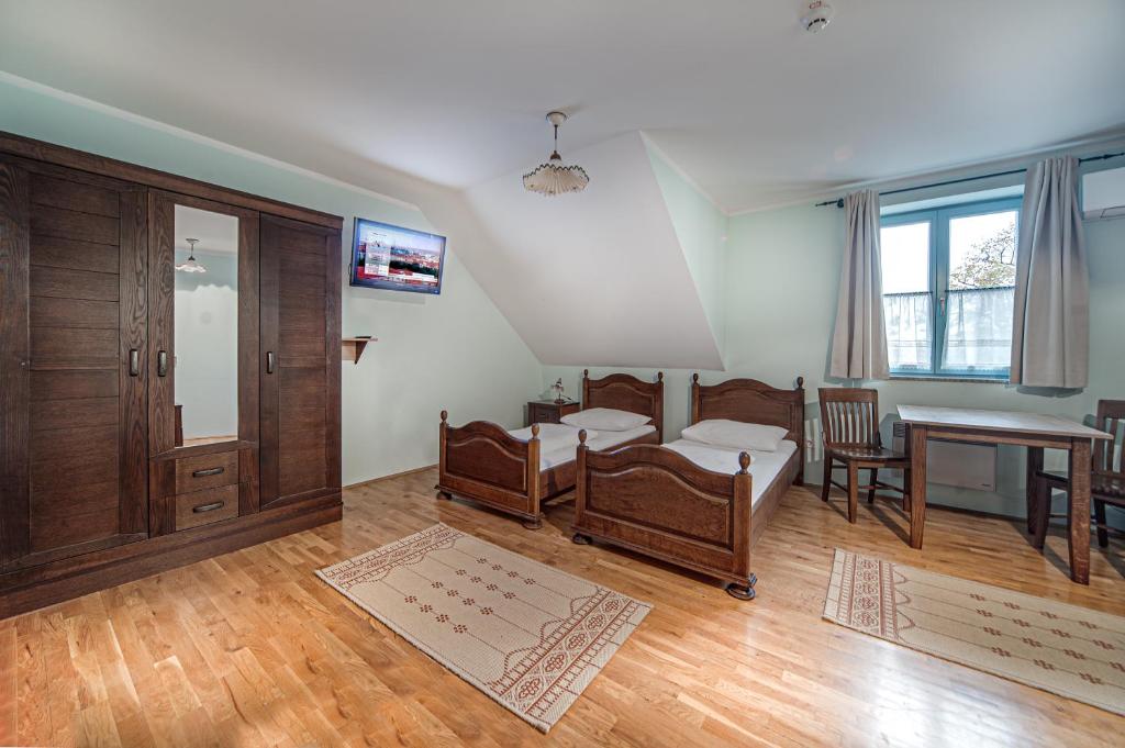 TV a/nebo společenská místnost v ubytování Parma Guesthouse & Apartments