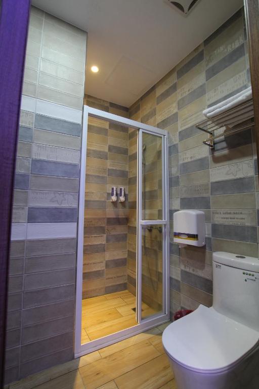 Koupelna v ubytování Lang Qin B&B
