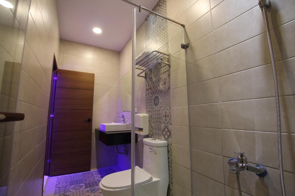 Koupelna v ubytování Lang Qin B&B
