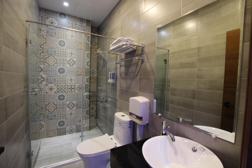 Koupelna v ubytování Lang Qin B&B