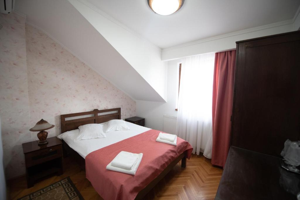 Postel nebo postele na pokoji v ubytování Pension Arena