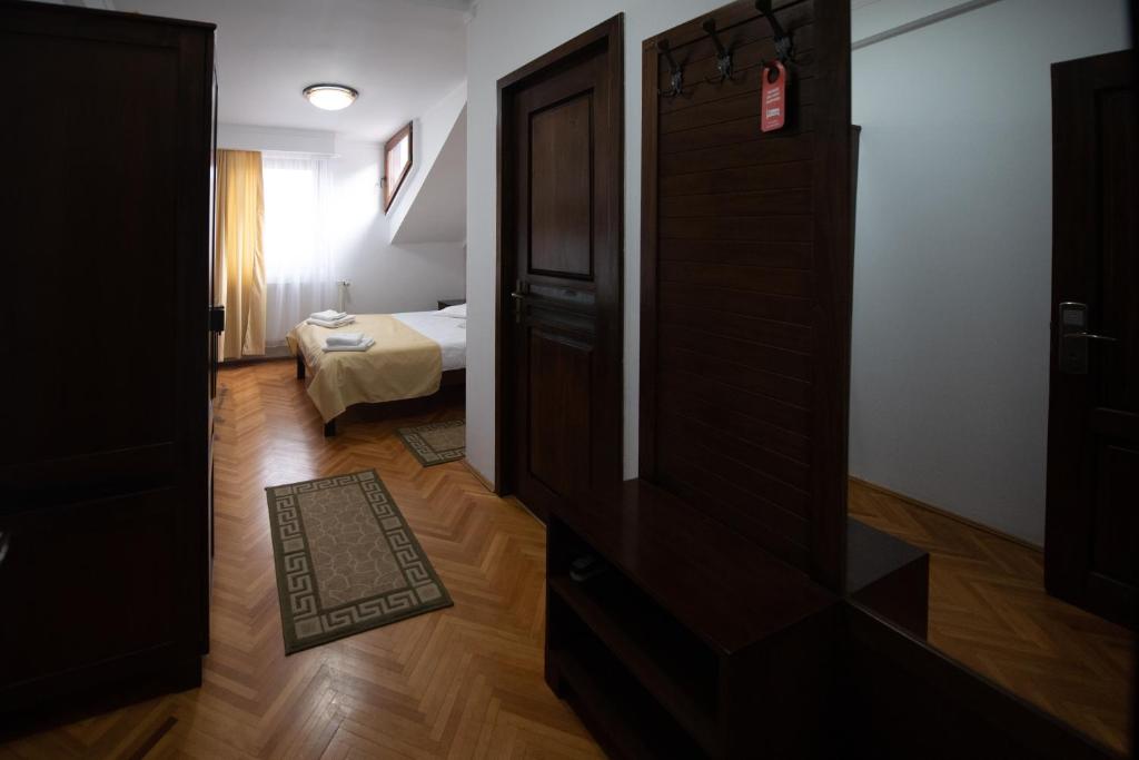 Postel nebo postele na pokoji v ubytování Pension Arena
