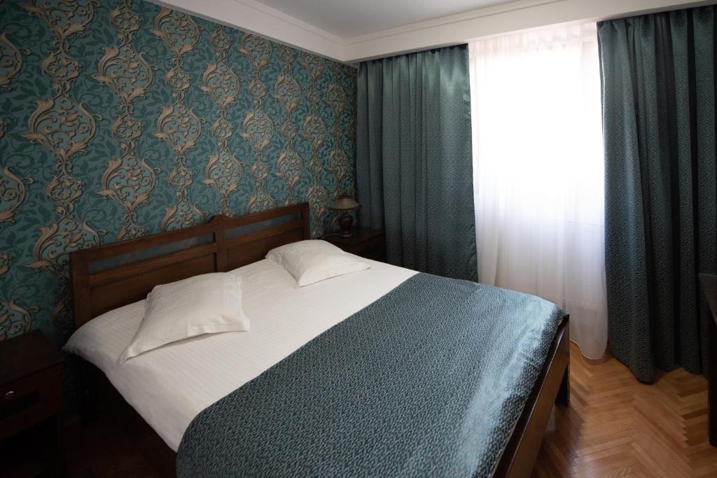 Postel nebo postele na pokoji v ubytování Pension Arena