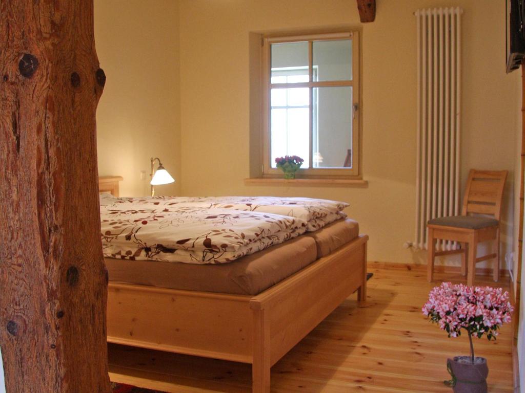 Giường trong phòng chung tại Rittergut Reudnitz