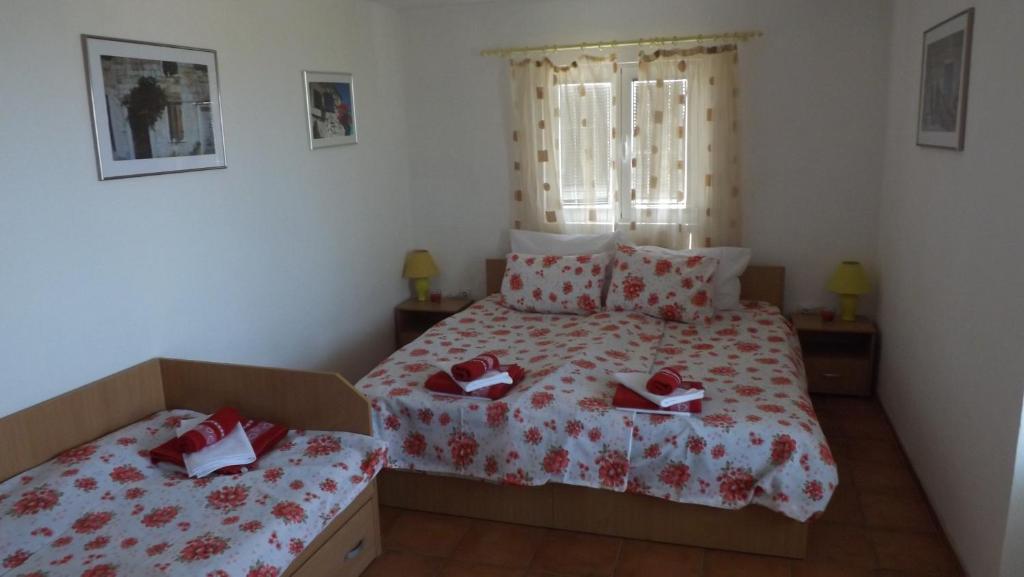 Voodi või voodid majutusasutuse Luštica Apartments toas