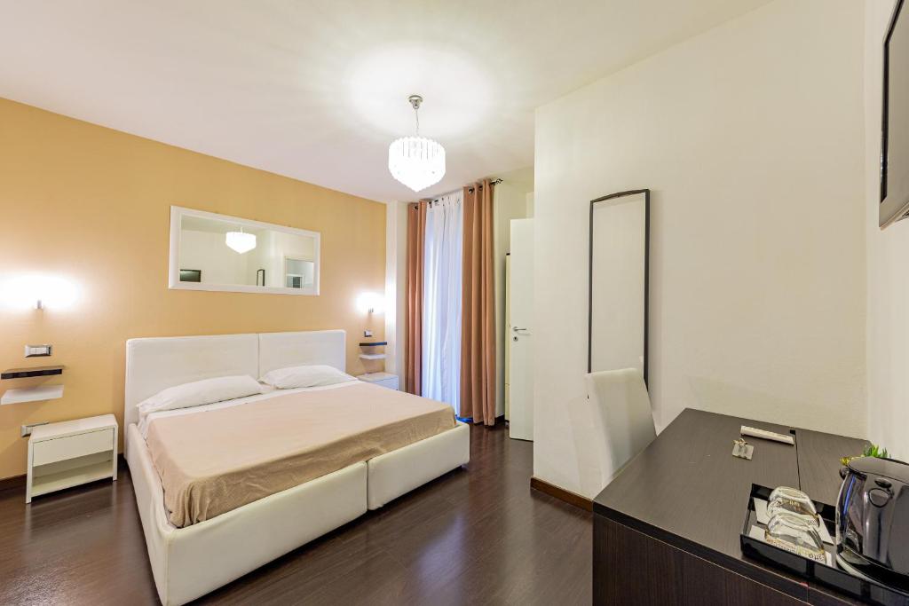 Postel nebo postele na pokoji v ubytování Sweetdreams Plaça Civica