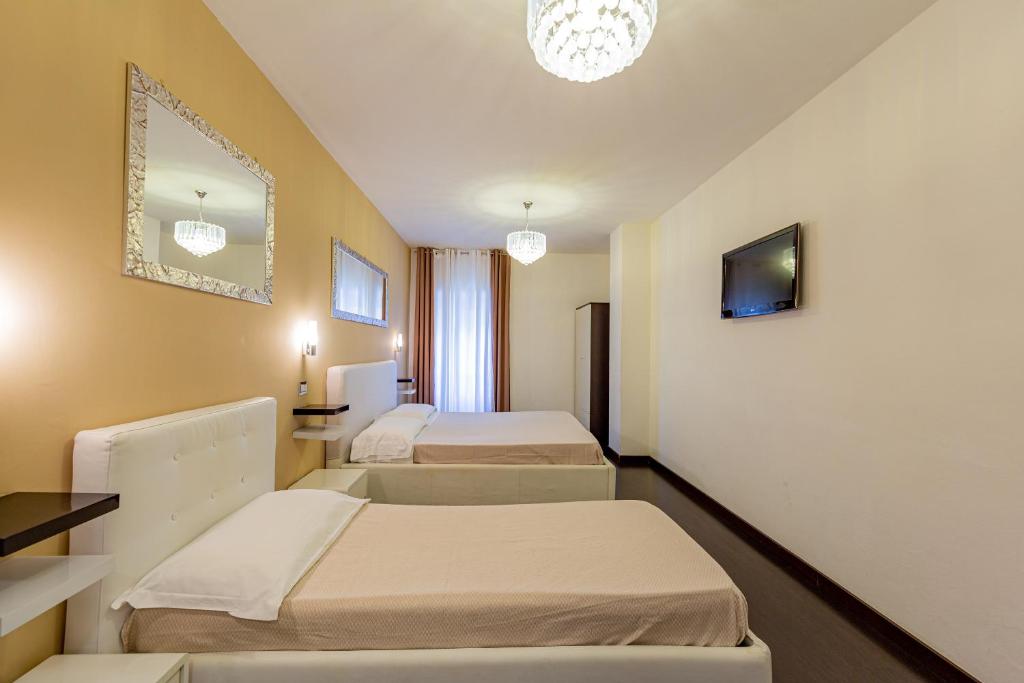 Postel nebo postele na pokoji v ubytování Sweetdreams Plaça Civica