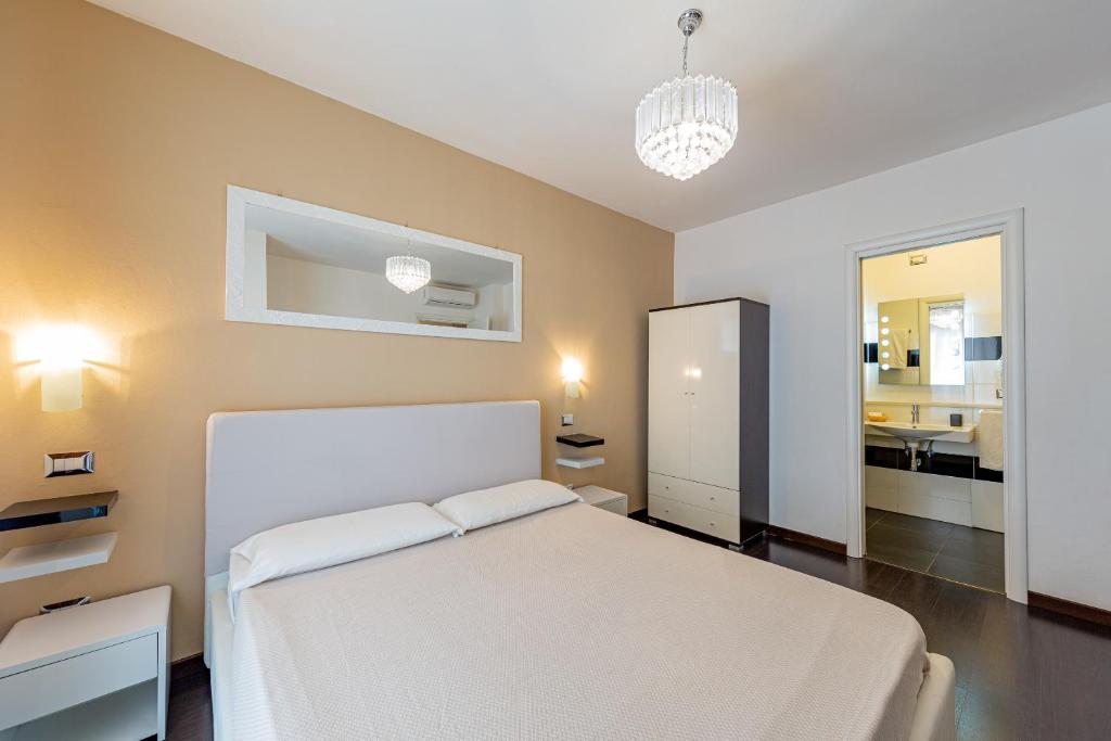 Postel nebo postele na pokoji v ubytování Sweetdreams Plaça Civica