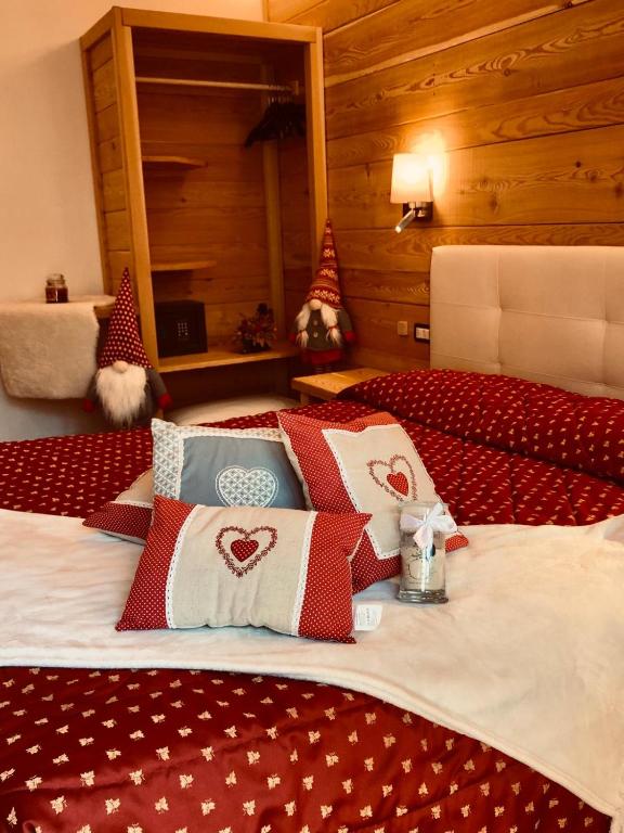 Postel nebo postele na pokoji v ubytování Albergo Garni Martina