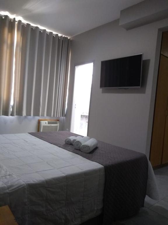 Postel nebo postele na pokoji v ubytování Presidente Hotel