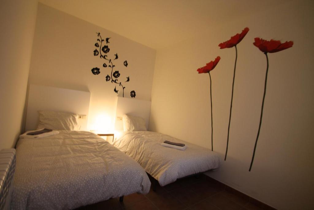 Postel nebo postele na pokoji v ubytování Ensagents, Canillo centro, Zona Grandvalira