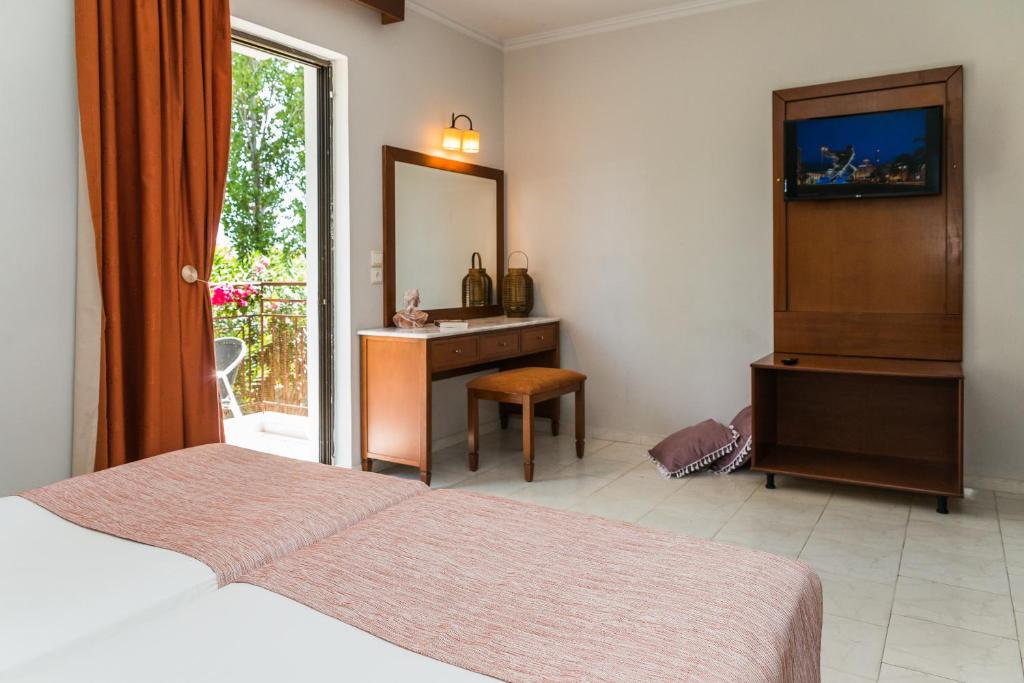 Postel nebo postele na pokoji v ubytování Kalidonio Studios Zante