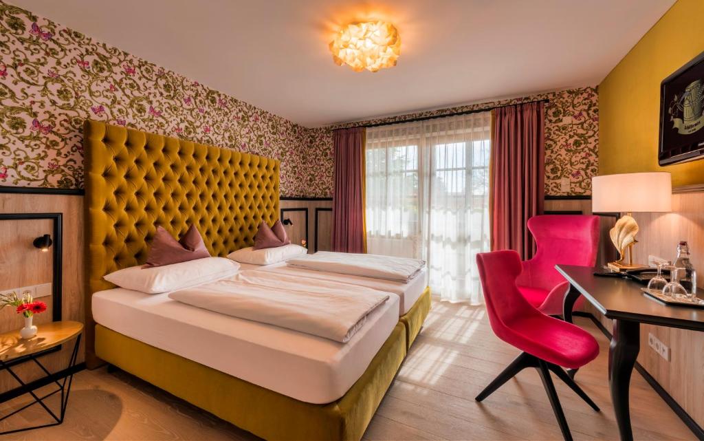 Postel nebo postele na pokoji v ubytování Hotel Schäfflerwirt