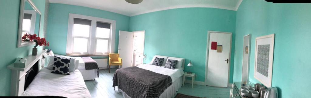 Letto o letti in una camera di Caspian Hotel