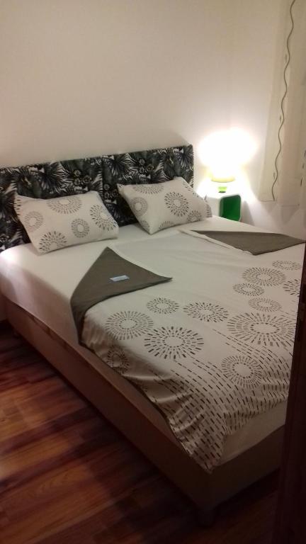 Postel nebo postele na pokoji v ubytování Apartment Biser