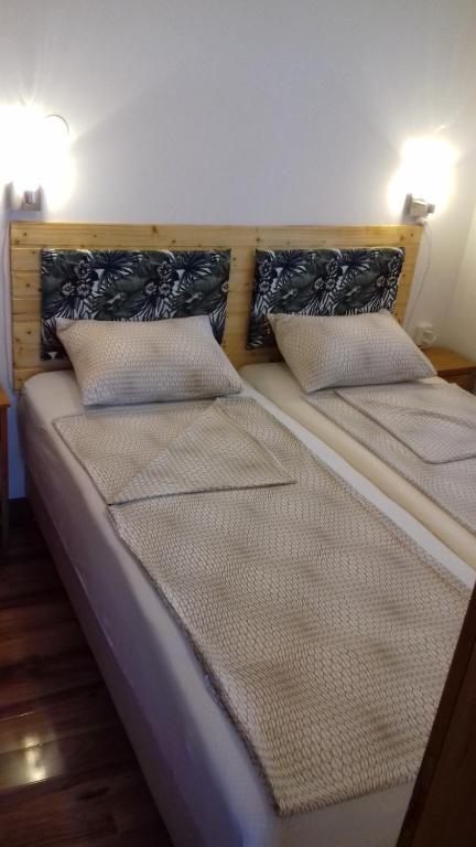 Postel nebo postele na pokoji v ubytování Apartment Biser
