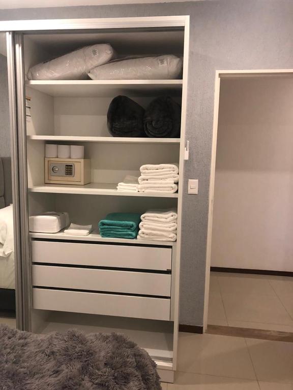 Postel nebo postele na pokoji v ubytování Asuncion Gracia Suites