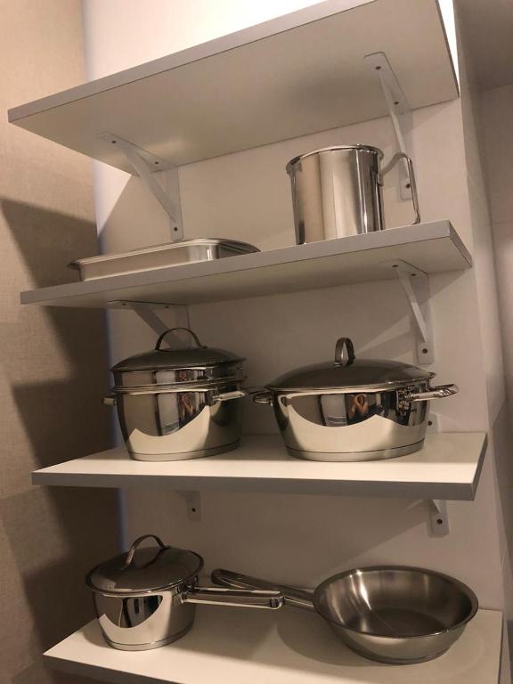 Kuchyň nebo kuchyňský kout v ubytování Asuncion Gracia Suites