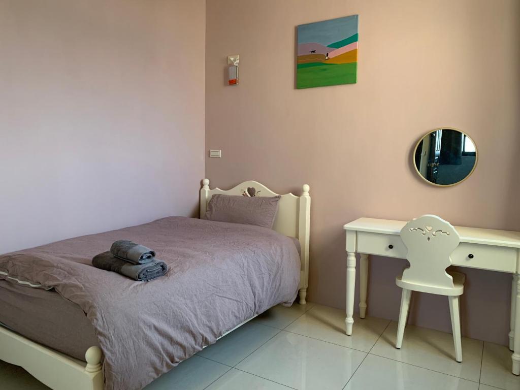 Postel nebo postele na pokoji v ubytování White Cat B&B