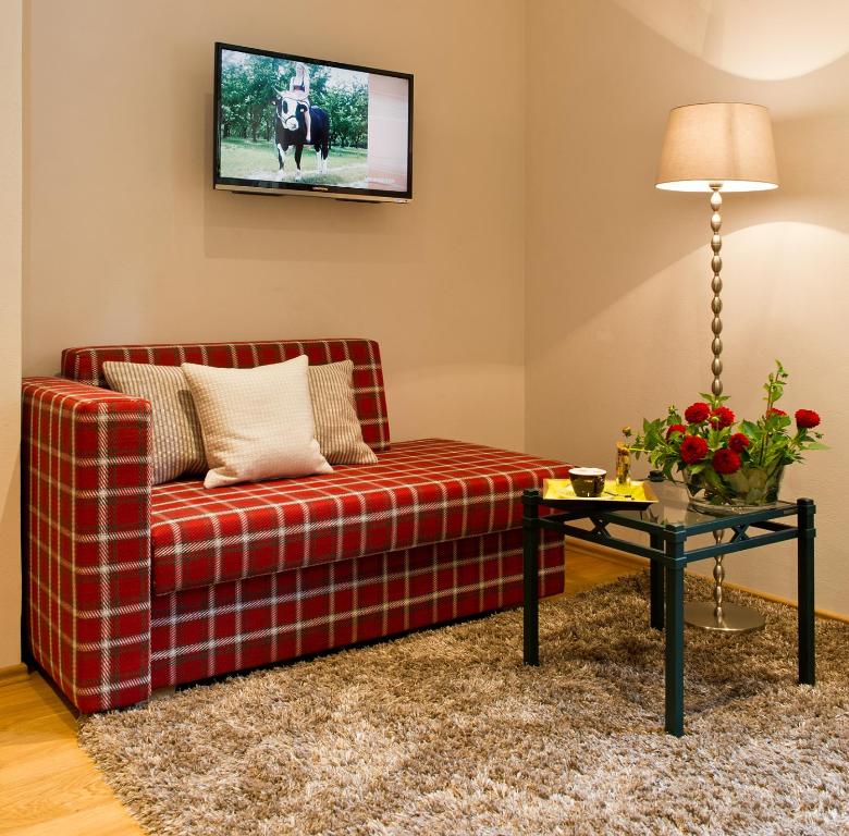 TV a/nebo společenská místnost v ubytování Romantik Hotel Markusturm