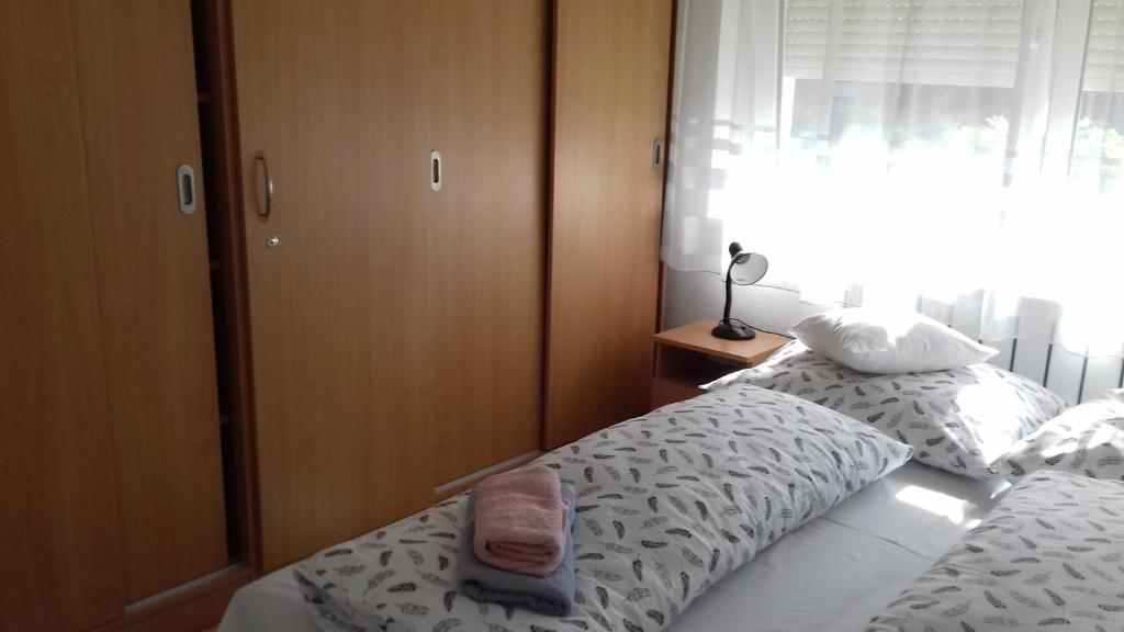 Posteľ alebo postele v izbe v ubytovaní Apartman Venus