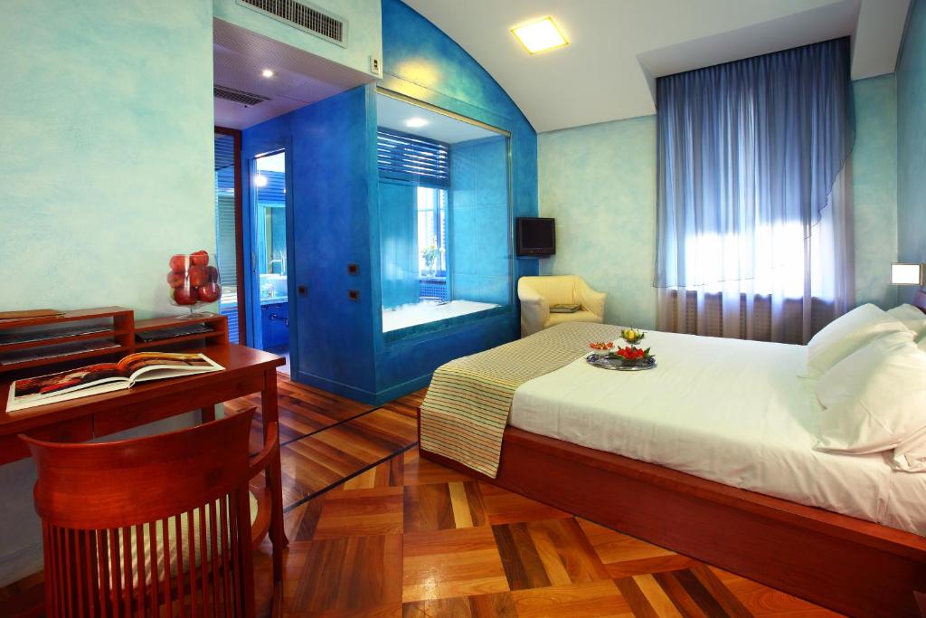 Postel nebo postele na pokoji v ubytování Hotel Sanpi Milano