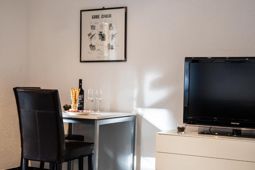 TV a/nebo společenská místnost v ubytování Bacchus Saas-Fee