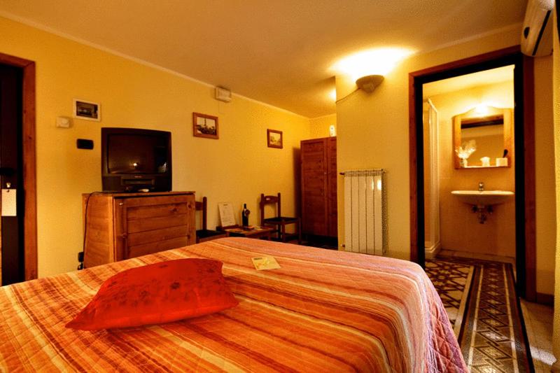 Postel nebo postele na pokoji v ubytování Valentino