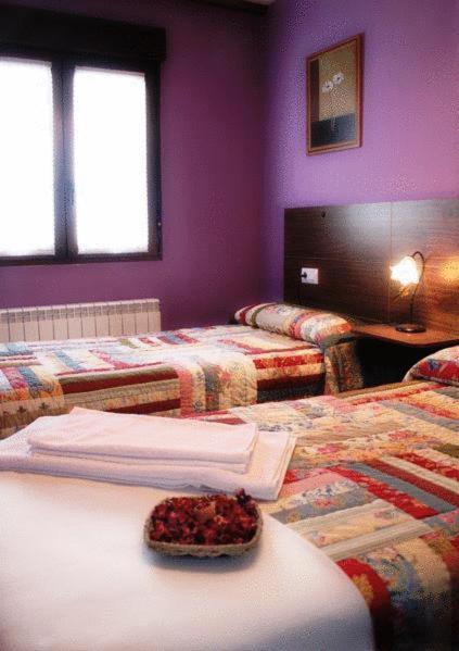 Posteľ alebo postele v izbe v ubytovaní Apartamentos Rurales Sierra de Béjar