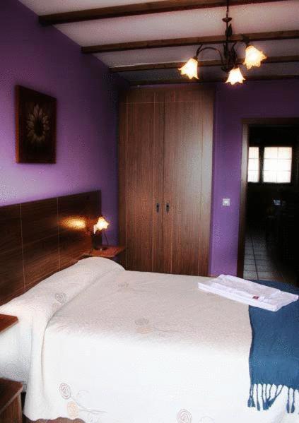 Posteľ alebo postele v izbe v ubytovaní Apartamentos Rurales Sierra de Béjar
