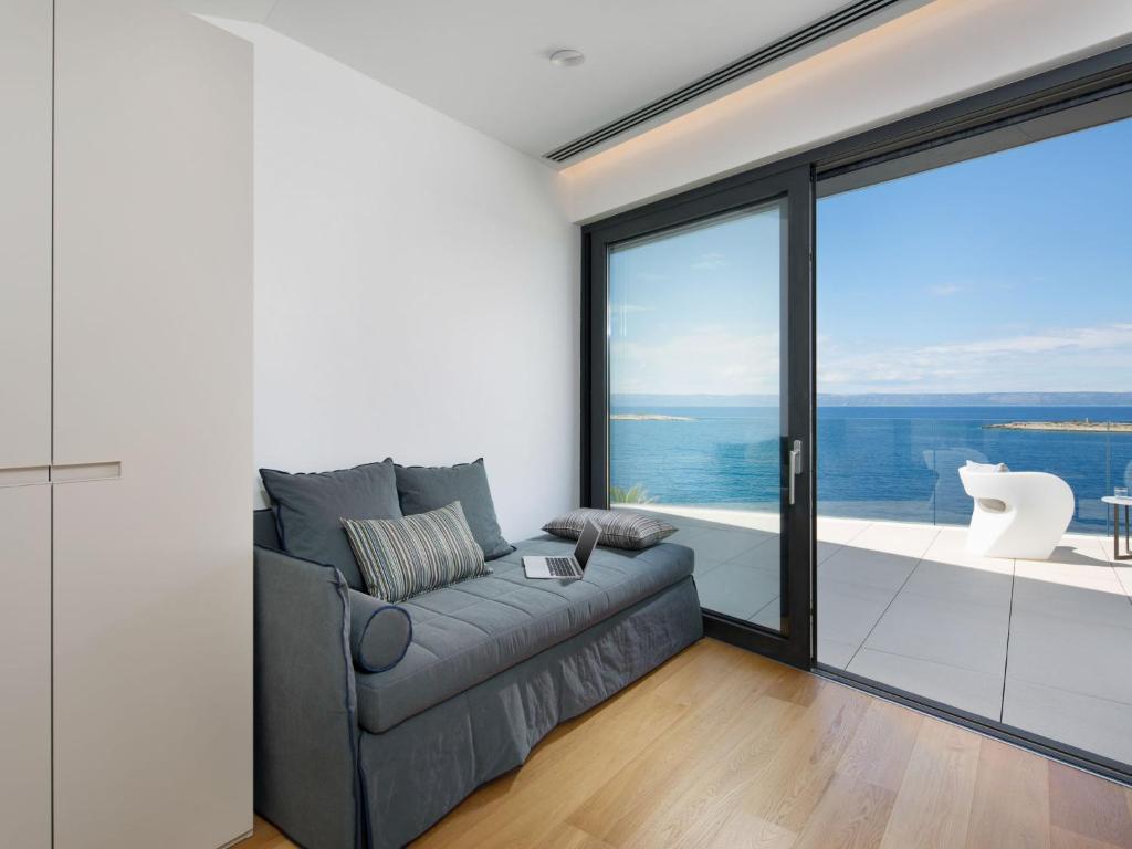 Posezení v ubytování Villa Palma by Interhome