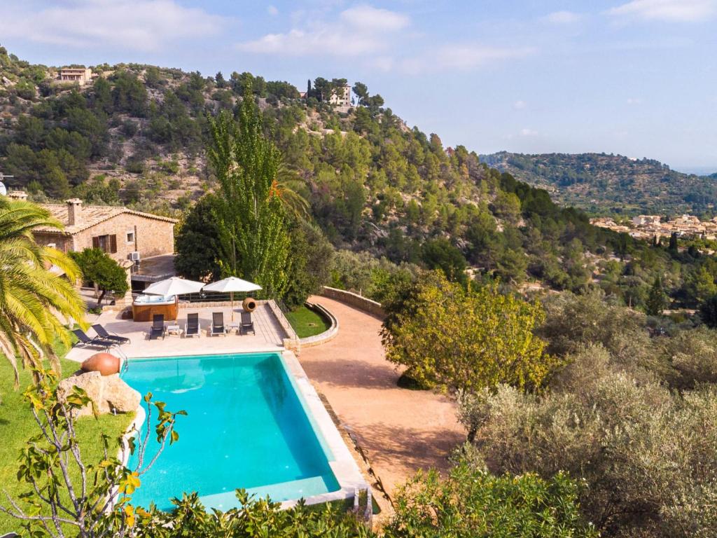 The swimming pool at or close to Villa Santa Llucia by Interhome